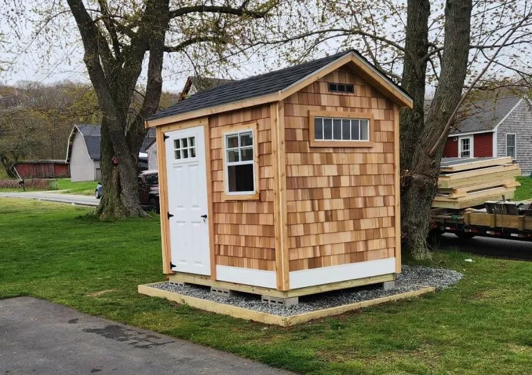 chateau shed with cedar wood shakes built by Eastern Shed